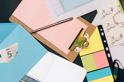 tax forms and calculator on a desk