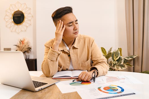 freelancer checking financial documents at a desk