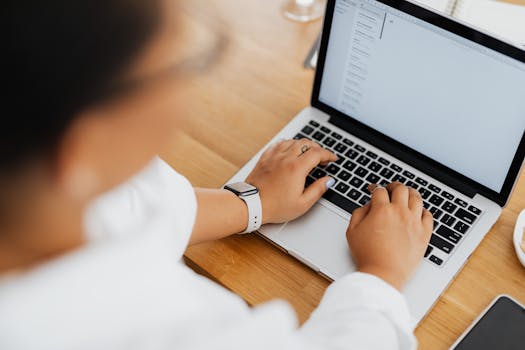 image of a freelancer working at a desk with budget tools