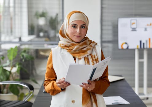 a successful freelancer smiling with financial documents