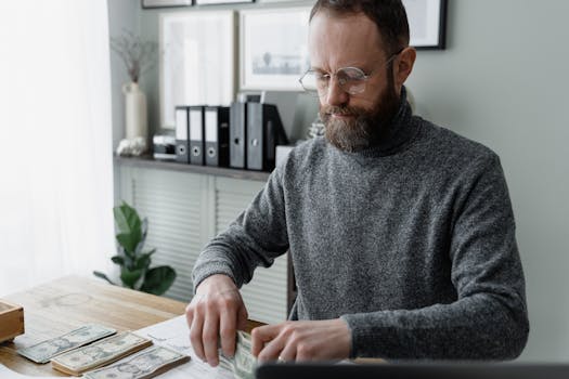 person holding retirement savings plan