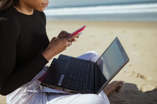 image of a freelancer working from a beach